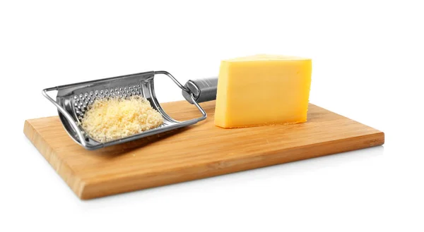 Grater and piece of cheese — Stock Photo, Image
