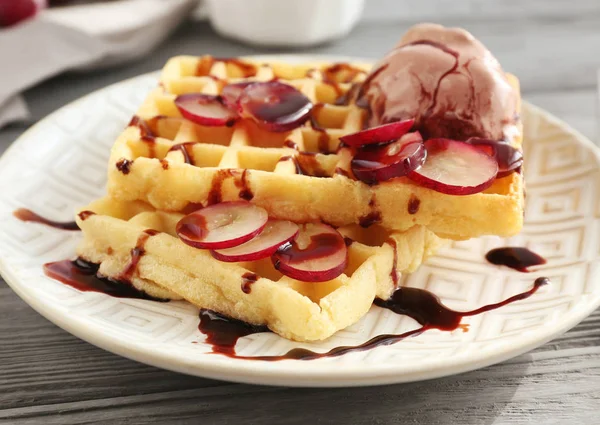 Tasty waffles with delicious grape — Stock Photo, Image