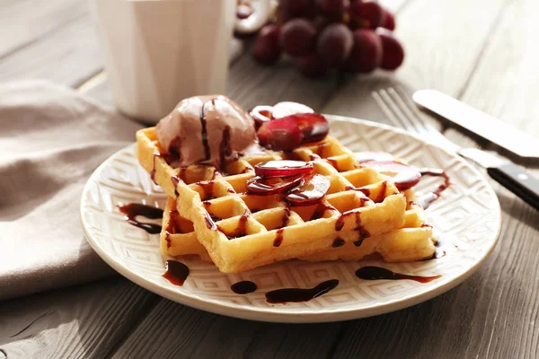 Tasty waffles with delicious grape — Stock Photo, Image