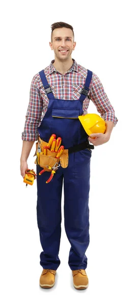 Young electrician with tools and helmet — Stock Photo, Image