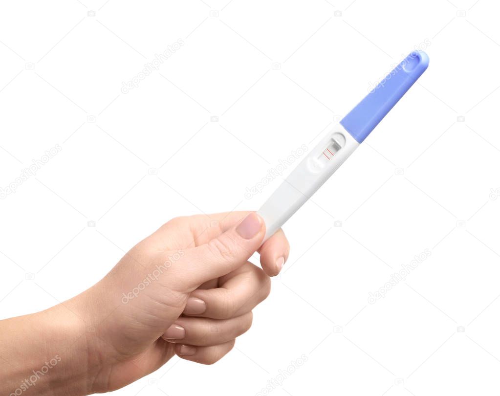 Pregnancy test in hand 