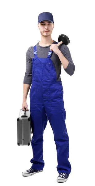 Young plumber holding plunger — Stock Photo, Image