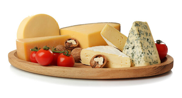 Board with assortment of cheese and  tomatoes