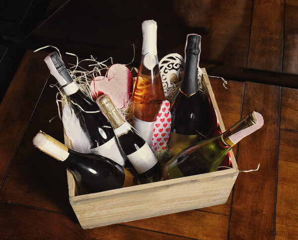 Wooden crate with wine bottles