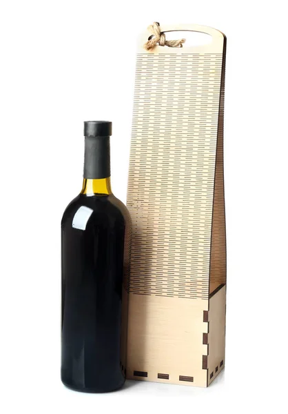 Mesa con botella de vino en caja de regalo — Foto de Stock