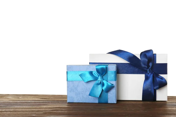 Beautiful gift boxes with satin ribbons — Stock Photo, Image