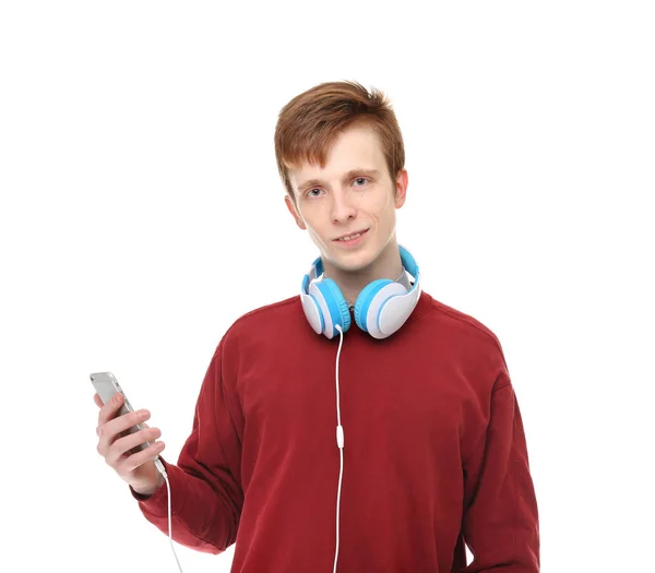 Hareket eden telefon ve kulaklık ile genç — Stok fotoğraf