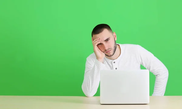 Handsome young man suffering from headache — Stock Photo, Image