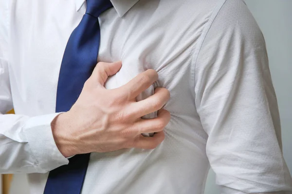 Man suffering from chest pain — Stock Photo, Image