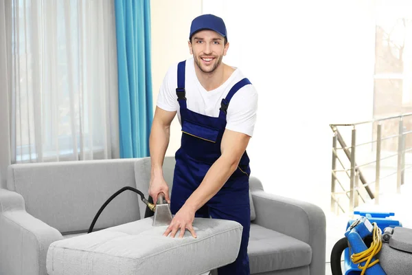 Dry cleaner's employee — Stock Photo, Image