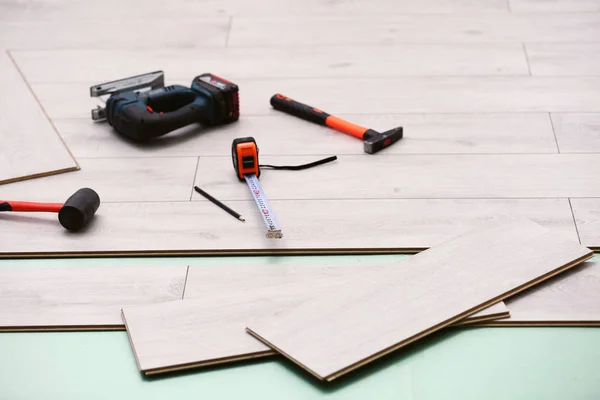 Laminate installing equipment — Stock Image Laminate installing equipment Stock Picture