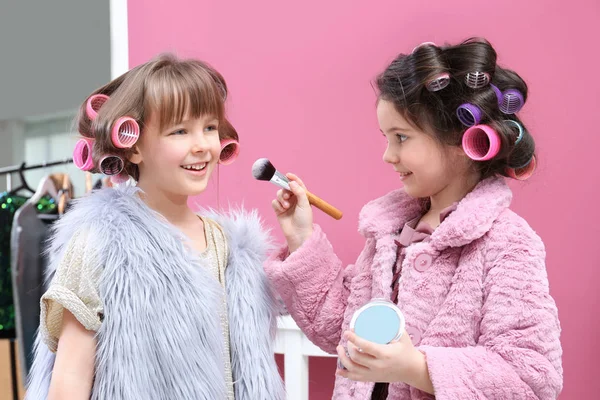 Cute little girls playing with their mother's stuff at home — Stock Photo, Image