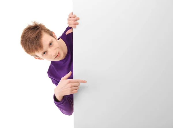 Teenager with blank poster — Stock Photo, Image