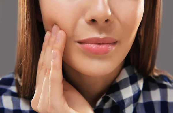 Beautiful young woman suffering — Stock Photo, Image