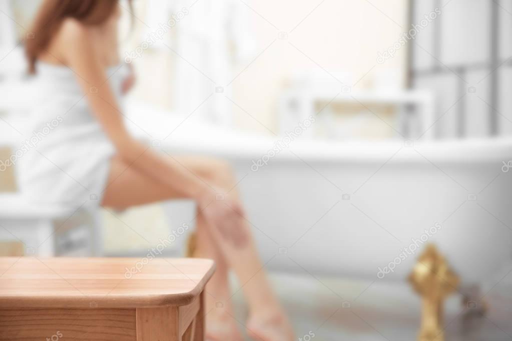 Wooden stool in bathroom