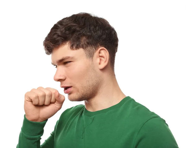 Jonge zieke man op witte achtergrond — Stockfoto