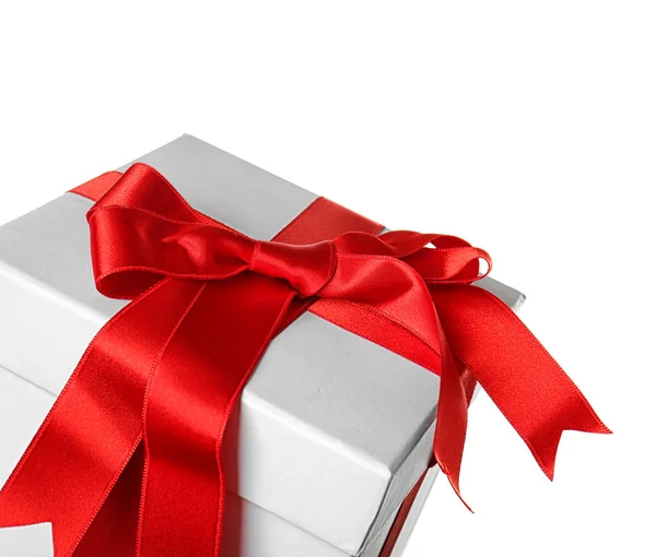 Beautiful gift box with red ribbon — Stock Photo, Image