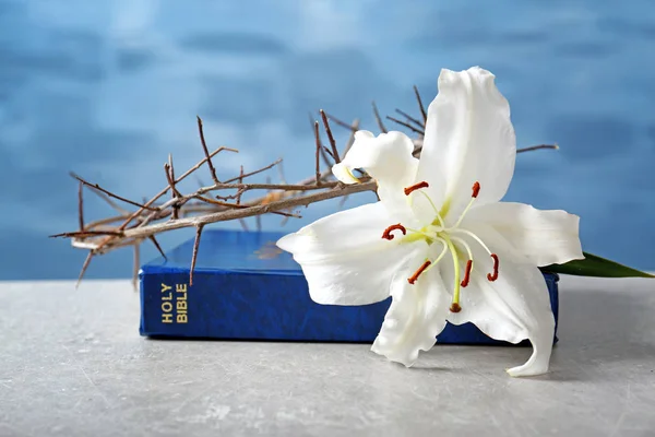 Holy Bible, lily and crown of thorns