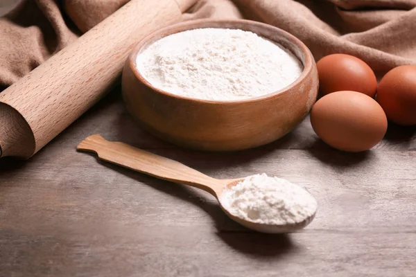 Bowl with flour on  table — Stock Photo, Image