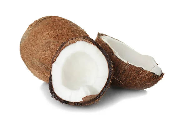 Noix de coco et délicieuses moitiés de noix de coco — Photo