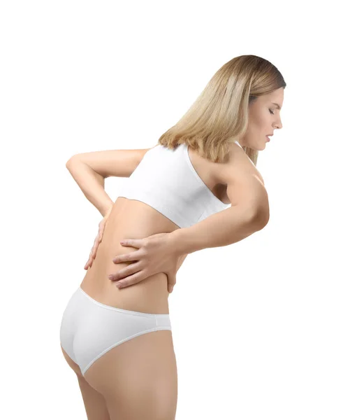 Young woman suffering from back pain — Stock Photo, Image