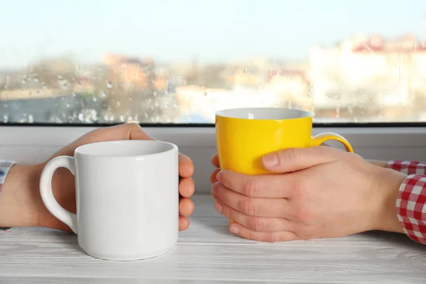 People holding cups — Stock Photo, Image