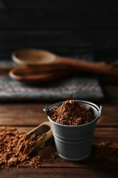 Small decorative bucket with cocoa powder — Stock Photo, Image