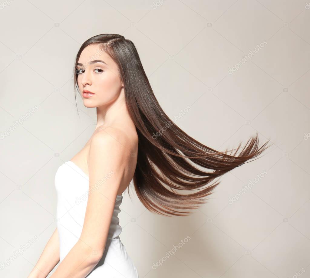 young woman with long straight hair