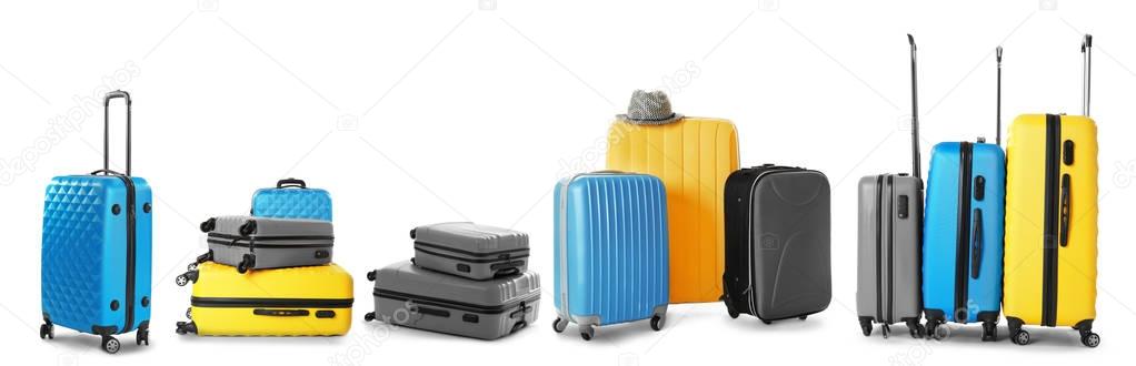 Set of suitcases on white 