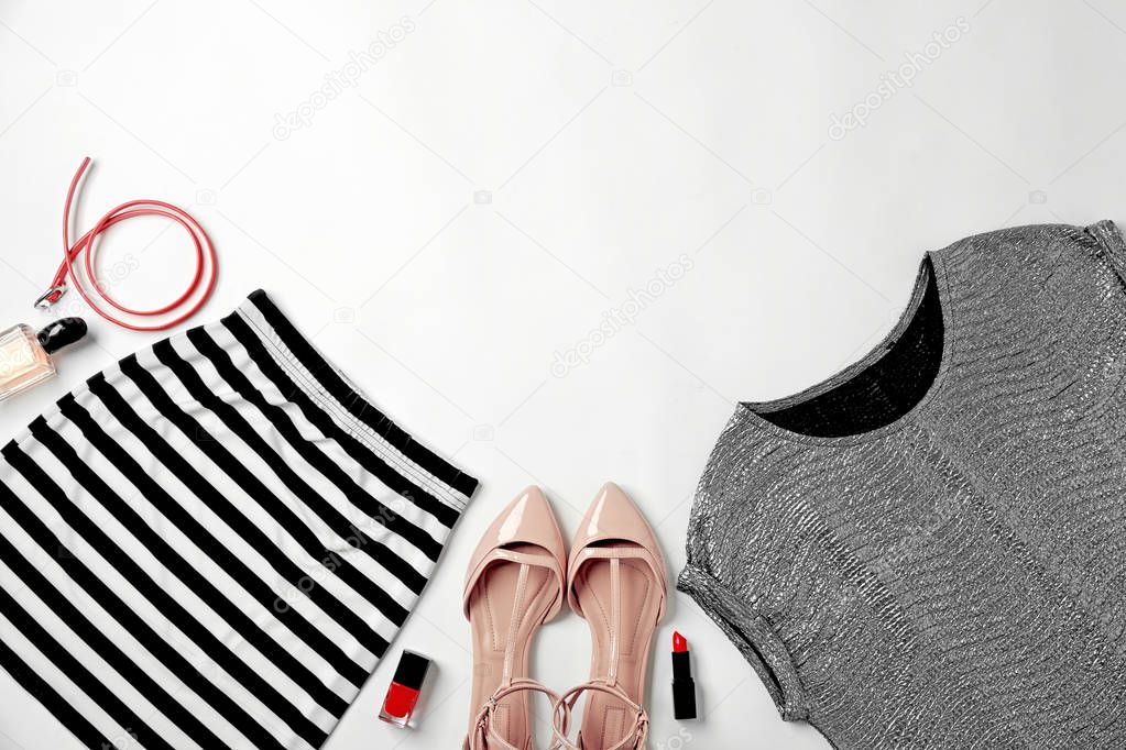Set of stylish clothes and cosmetics 