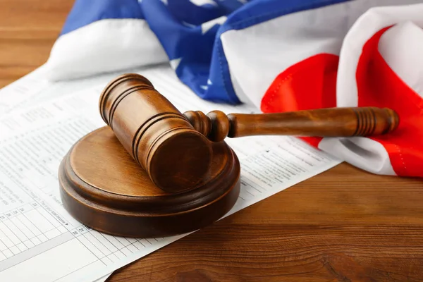 Judge's gavel with individual tax return form and American flag — Stock Photo, Image