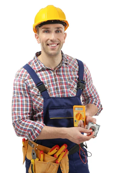 Young electrician holding socket — Stock Photo, Image