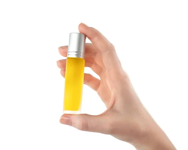 Hand holding bottle with perfume — Stock Photo, Image