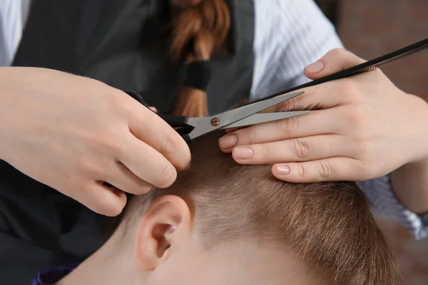 boy in hairdressing salon