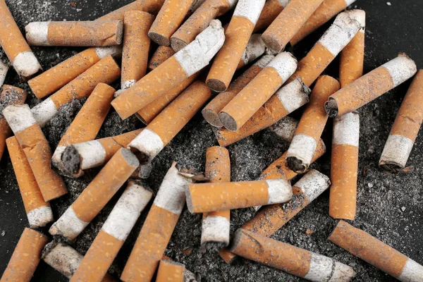 Dirty cigarette butts — Stock Photo, Image