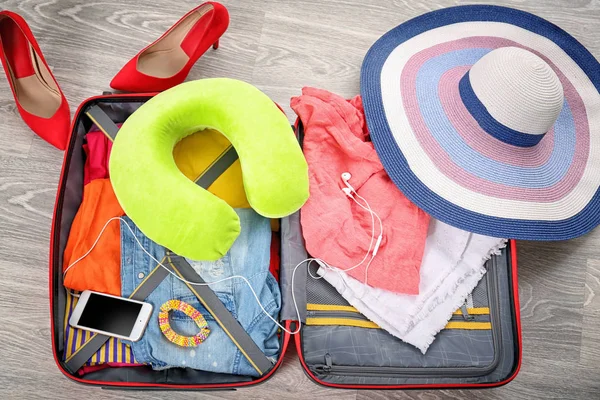 Suitcase with different things — Stock Photo, Image