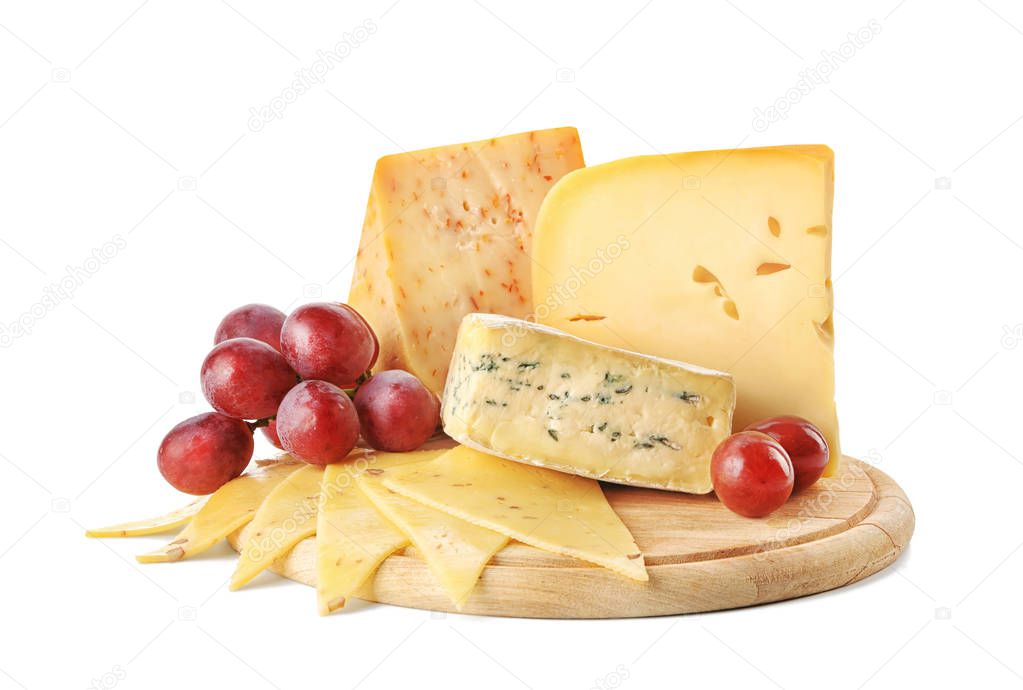 Wooden board with tasty cheese