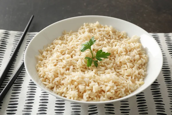 Plate with brown rice — Stock Photo, Image