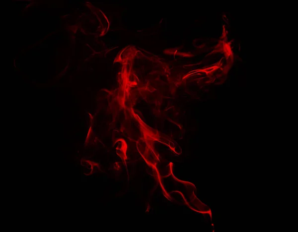 Tourbillon de fumée rouge — Photo