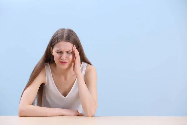 Young woman suffering from headache — Stock Photo, Image