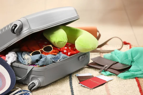 Suitcase with different things — Stock Photo, Image
