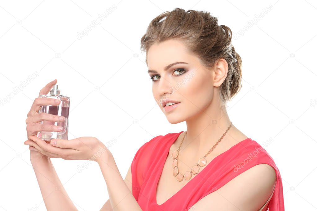 young woman with bottle of perfume