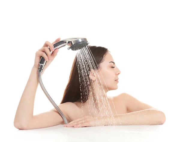 Young woman with shower head — Stock Photo, Image