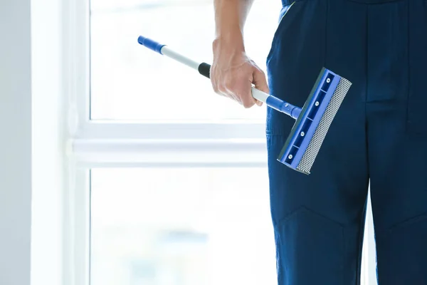 Window cleaner with special mop indoors, closeup — Stock Photo, Image