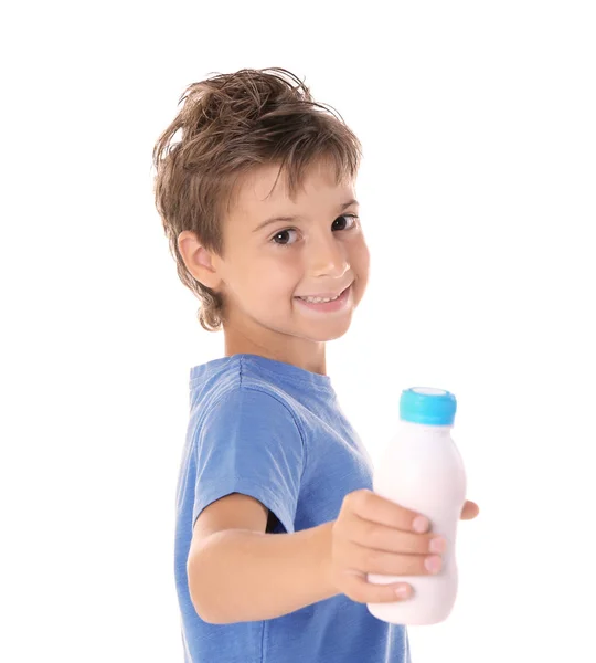 Kid holding plastic bottle of milk — Stock Photo, Image