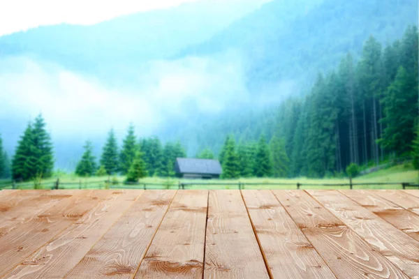 Wooden surface with beautiful landscape — Stock Photo, Image