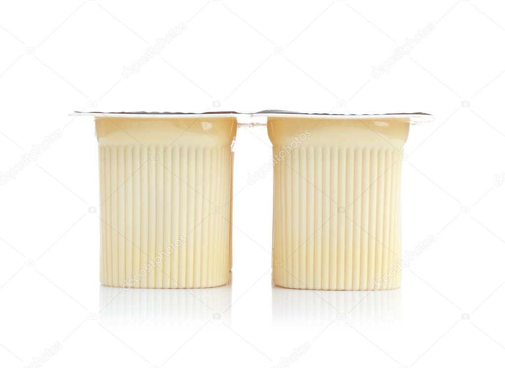 Plastic cups with yogurt 