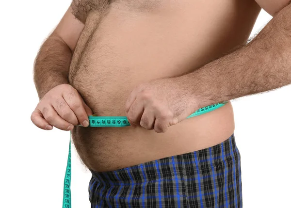 Man measuring beer belly — Stock Photo, Image