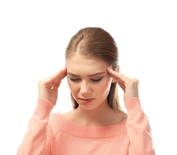 Beyaz arka plan üzerinde baş ağrısı muzdarip güzel genç kadın — Stok fotoğraf