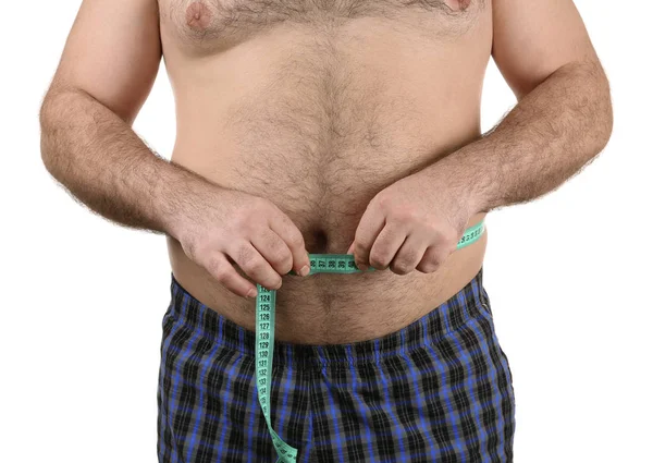 Mann misst Bierbauch — Stockfoto